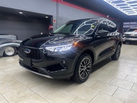 The 2024 Ford Escape in the elegant Black finish coupled with a Front-Wheel Drive system offers an e... (image 7)