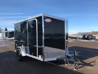 IRON LITE SERIES 6' X 10' SINGLE AXLE CARGO TRAILER WITH REAR RAMP DOOR AND POLYCORE UPGRADES! Unloc...