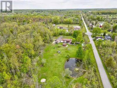 A rare opportunity to own a beautiful family home nestled on approximately 2 manicured acres featuri...