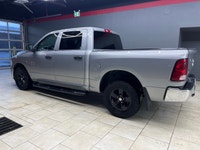The 2023 Ram 1500 Classic SLT, with its stunning silver finish and robust 44 drivetrain, effortlessl... (image 4)
