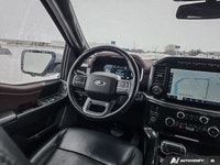 This 2023 Ford F-150 Lariat Crew Cab 4WD is powered by a robust 5.0L V8 engine paired with a smooth... (image 9)