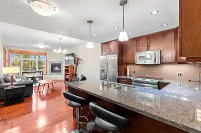 NEW PRICE $569,800 ~ Downtown Unit 103-32 Waterfront Place ~ QUICK POSSESSION! RIVER and GREEN SPACE...