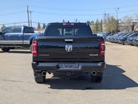 This pre-owned 2020 Ram 1500 Limited Crew Cab is finished in Diamond Black Crystal Pearl with a refi... (image 4)