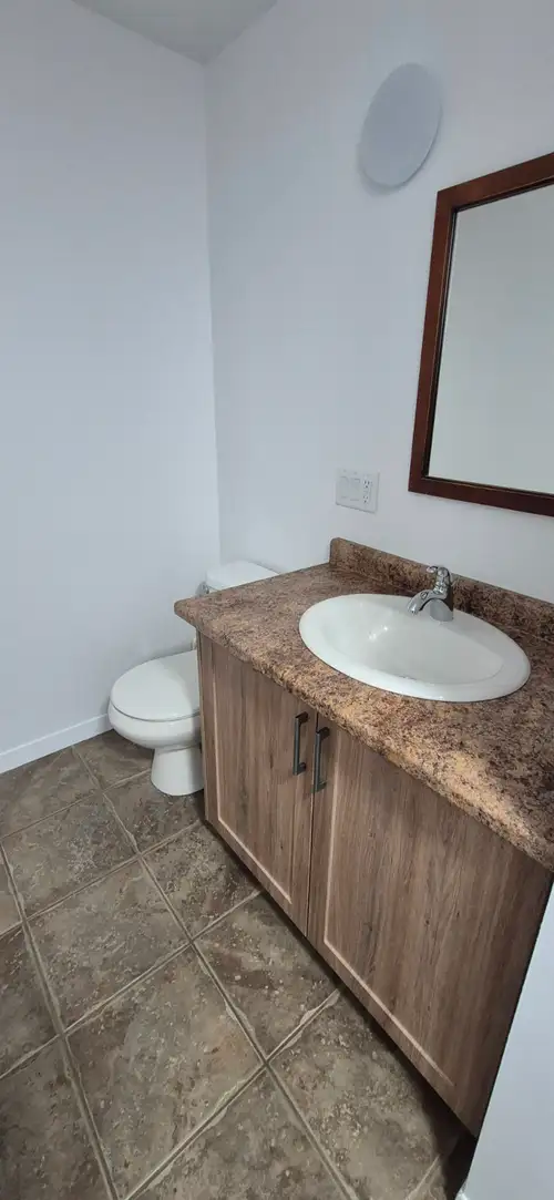 Large upstairs apartment with covered balcony and newly renovated. Located in a quiet area, has a sm...