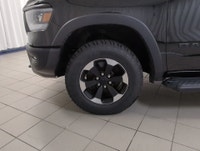 Remarkably capable, our 2022 RAM 1500 Rebel Crew Cab 4X4 is a terrific trail truck with a rugged Dia... (image 9)