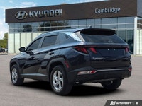 The refined 2022 Hyundai Tucson Preferred, stunning in Deep Sea Blue, combines everyday practicality... (image 2)