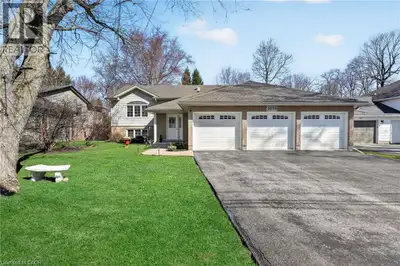 Just steps from the beach, this raised bungalow offers nearly 2500 sq ft of living space and a 3 car...
