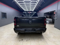 The 2019 Ram 1500 Sport 4x4 Quad Cab in a majestic black on black configuration exemplifies power, s... (image 5)