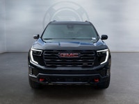 The 2026 Acadia AT4 mid-size SUV screams athletic attitude and features confident lines, eye-catchin... (image 7)