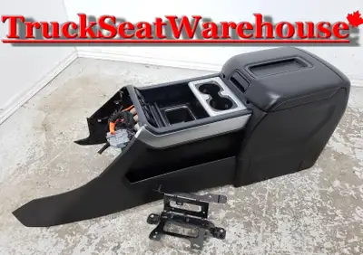 call or text 905-259-8027 or email truckseatwarehouse@gmail.com Black plastic center storage console...
