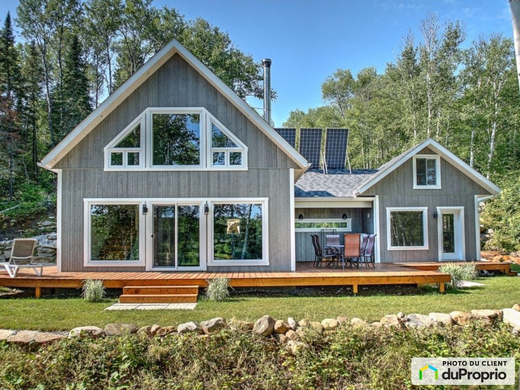$595,000 - Cottage for sale in St-Zénon — photo 1