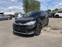 Le Honda CR-V Touring 2018 est un VUS compact haut de gamme reconnu pour sa fiabilité, son confort e... (image 4)