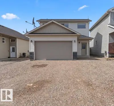 Looking for an investment property? One home with two rental incomes? Maybe live in one suite and re...