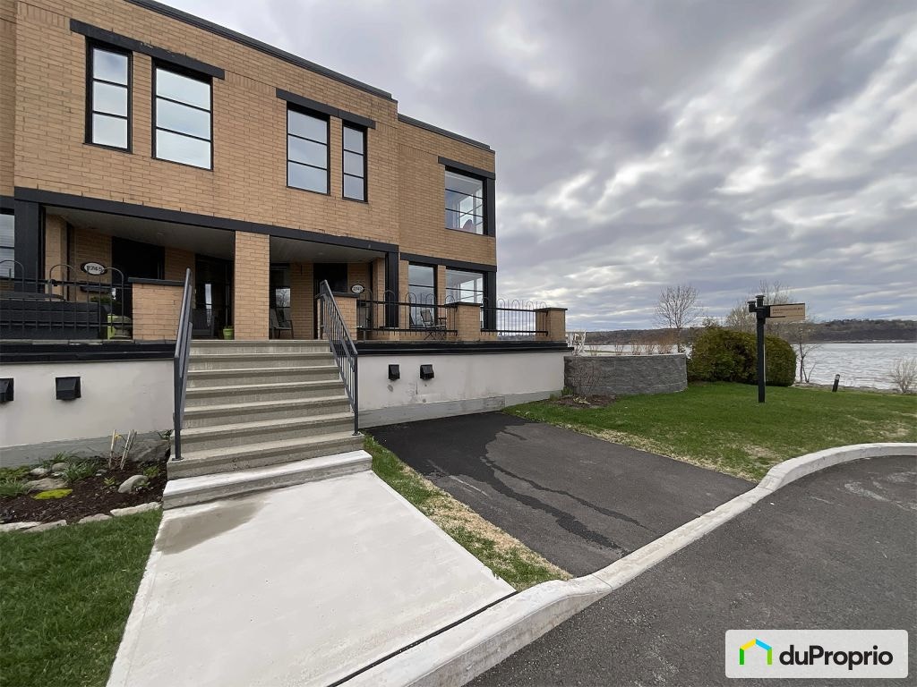 $870,000 - Condominium for sale in Levis — photo 1