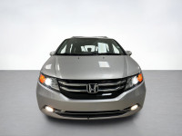 Our used family-friendly 2014 Honda Odyssey Touring is shown in stunning Alabaster Silver Metallic.... (image 7)