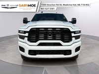 Introducing the 2026 Ram 2500 Big Horn 4x4 Crew Cab with a 64 Box in a vibrant white exterior paired... (image 5)
