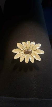 Brooch 2.5" X 1.75" ivory/ yellow with amber stones.