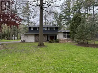 Featuring a beautifully treed 3/4-acre lot, this 4-bedroom, 4-level side split home is ready to beco...