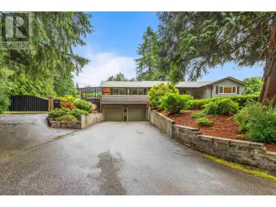 Discover a rare 1-acre property in town with a stunning park-like setting! This well-maintained 3 be...