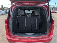 The 2026 Chrysler Grand Caravan SXT in Red Hot Pearl with a Black interior combines style, comfort,... (image 5)