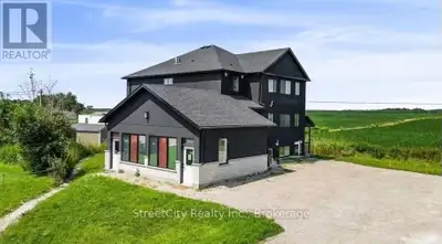 Modern 2-bedroom middle unit built within the last five years, featuring quality finishes and a brig...