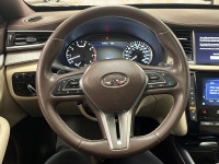 "I didnt expect an SUV to feel this composed and artful," says Maya R., a recent QX50 owner. "Every... (image 9)