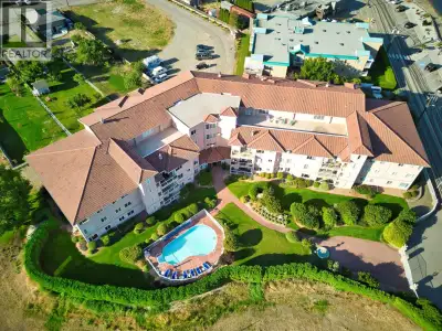 ***NEW PRICE*** Live the Okanagan dream in this exceptional semi-waterfront residence just steps fro...