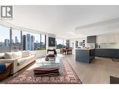 A sophisticated West End residence at Stanley Park Place, this exquisitely renovated 1,638 sq. ft. h...
