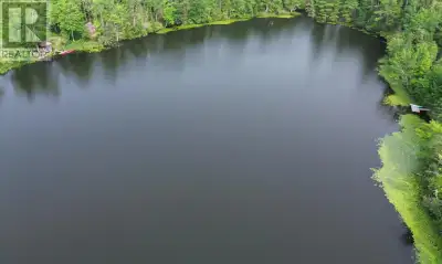Discover the ideal location for your dream home with this stunning lot on a small private lake in Br...