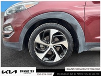 Experience the 2016 Hyundai Tucson Ultimate in its striking red exterior, offering the confidence of... (image 5)