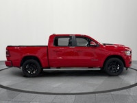 Power, luxury, and capability come together in this stunning 2022 Ram 1500 Laramie. Finished in a st... (image 6)