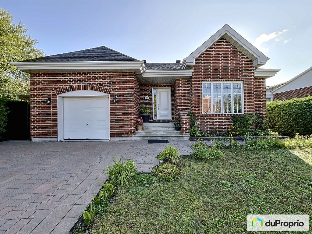 $899,900 - Duplex for sale in Ste-Rose — photo 1