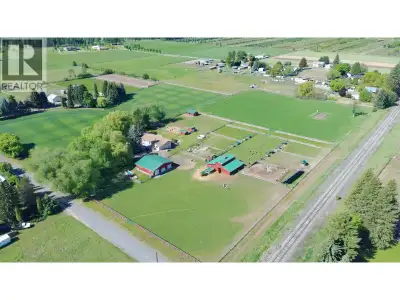 TWO-FAMILY LIVING & SELF-SUFFICIENT FARMSTEAD! This exceptionally designed 7.16-acre property offers...