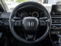 Sleek, efficient, and well-equipped, this 2024 Honda Civic Sedan EX CVT delivers sporty performance,... (image 8)