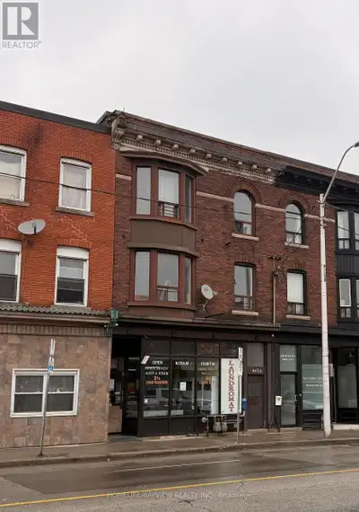 This building has commercial coin laundry on ground floor open 6 am - 10.30 pm with four apartments...