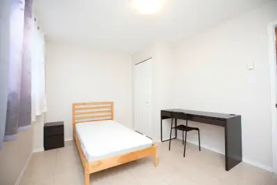 Furnished bedrooms are available in a secure, controlled-access building on Main Street above retail...