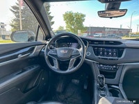 The 2021 Cadillac XT5 Premium Luxury includes a panoramic roof, ventilated front seats, heated rear... (image 8)