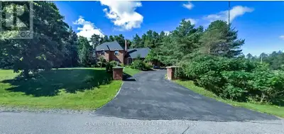 Welcome to this exquisite home in the prestigious "Trail of the Woods" community of multi-million do...