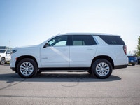 The 2022 Chevrolet Tahoe LS is a full-size SUV that blends power, space, and capability. With its 5.... (image 4)