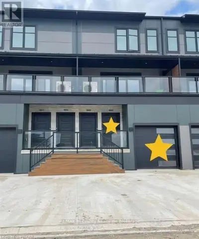 Lower level of stacked townhouse for lease. 2 bed, 2.5 bathrooms condo apartment with single car gar...