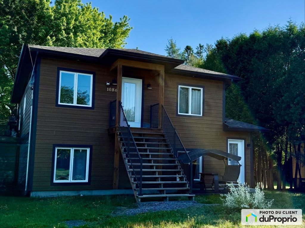 $649,000 - Bungalow for sale in Mont-Tremblant (St-Jovite) — photo 1