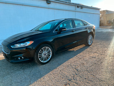 2016 Ford Fusion SE AWD (SAFETIED) $9,995