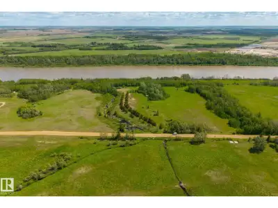 PRIME RIVERFRONT LAND WITH INCREDIBLE PERSONAL OR DEVELOPMENT POTENTIAL. Nestled along the banks of...