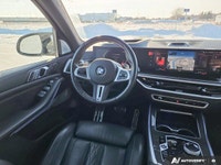 This *2023 BMW X7 M60i* is powered by a high-performance 4.4L twin-turbo V8 hybrid engine paired wit... (image 9)