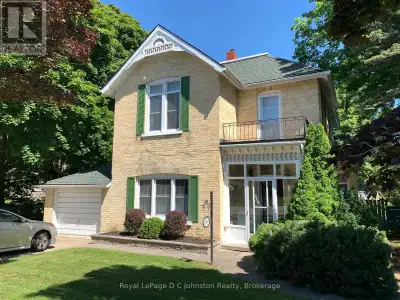 Nestled in the heart of Southampton on a 100' x 106' lot, this timeless two-storey yellow brick home...