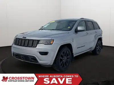 Make a bold, blacked-out statement with this 2021 Jeep Grand Cherokee Altitude. This popular trim le...