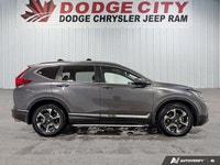 The 2018 Honda CR-V Touring AWD delivers premium comfort, advanced safety, and confident all-weather... (image 6)