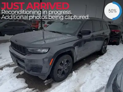 Experience the power and versatility of the 2021 Jeep Grand Cherokee L Altitude 4x4 in a stunning gr...