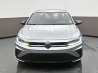 The 2025 Volkswagen Jetta Comfortline Sport features a turbocharged 1.5L 4-cylinder engine paired wi... (image 1)