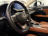 The RX 450h Executive is defined by its "creamy" ride quality and meticulously crafted interior. For... (image 4)